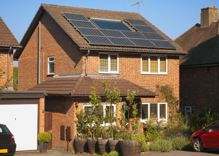 modern detached home with solar panels